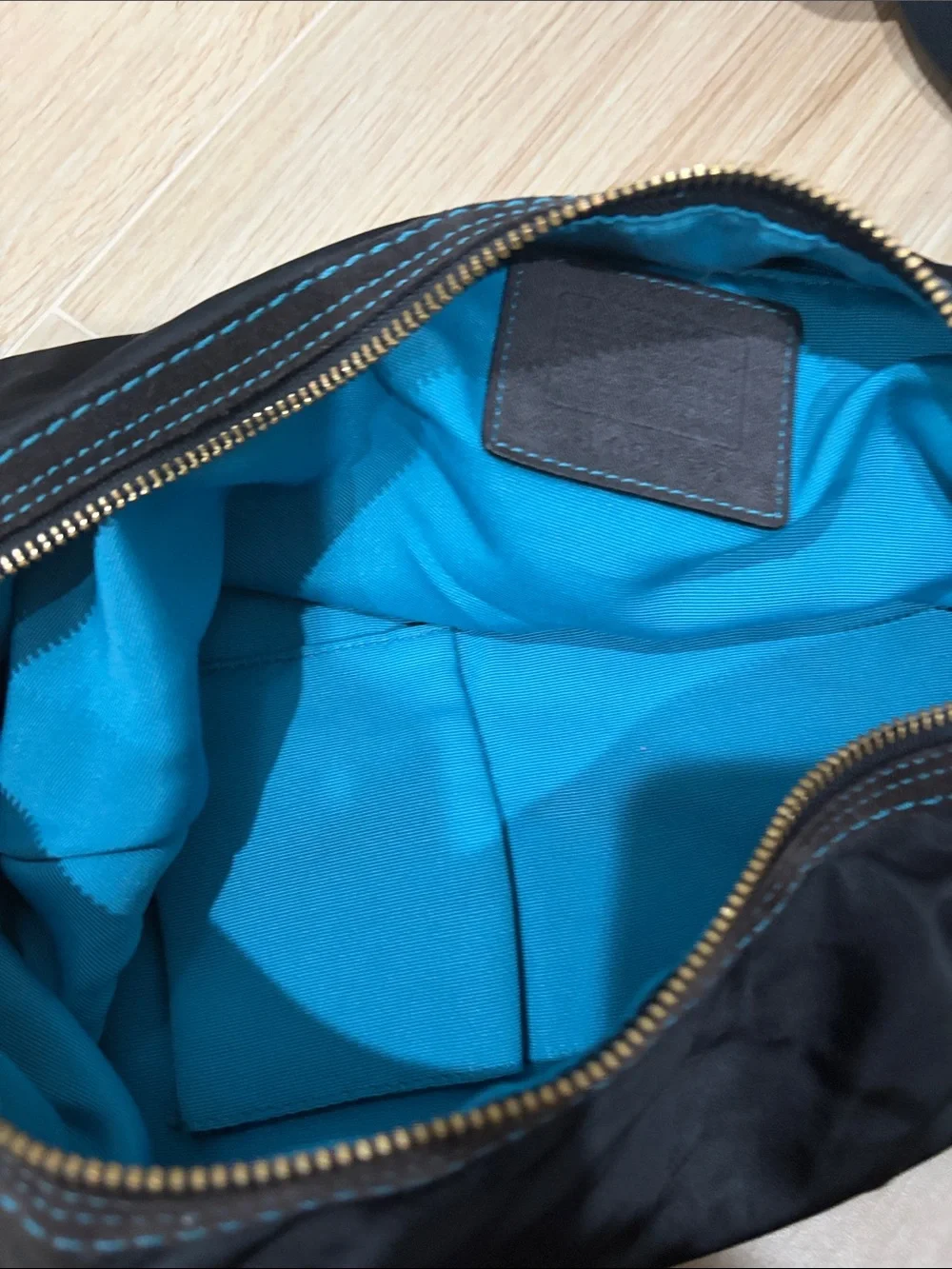 Coach Black Hobo Bag with Turquoise Tag Accent